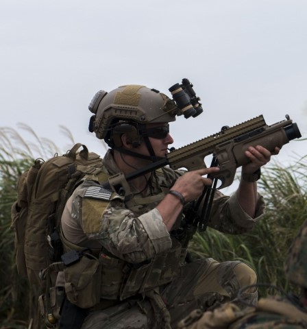 A U.S. Air Force combat control Airman from the 320th Special Tactics
Squadron fires a 40 mm grenade launcher during a training exercise March 10, 2017, at the Irisuna Jima Training Range, Okinawa, Japan. The Airman joined a joint training exercise with U.S. Marines from the III Marine
Expeditionary Force to pursue advanced JTAC qualifications. Smoke grenades are used as a visual marker for friendly aircraft. (U.S. Air Force photo by Senior Airman John Linzmeier)